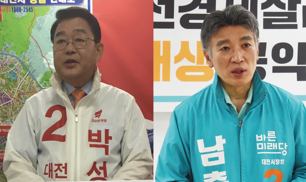 박성효 한국당 대전시장 후보(왼쪽)와 남충희 바른미래당 대전시장 후보 / 뉴시스
