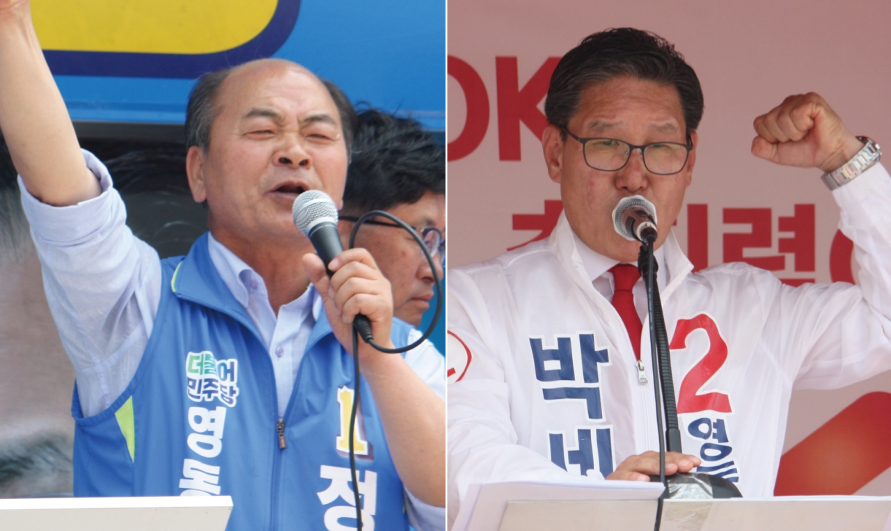 정구복 민주당 영동군수 후보(왼쪽)와 박세복 한국당 후보